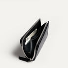 Portefeuille cuir femme ou homme avec rangement billets et monnaie, gousset intérieur.
