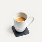 Sous tasse en cuir marine.