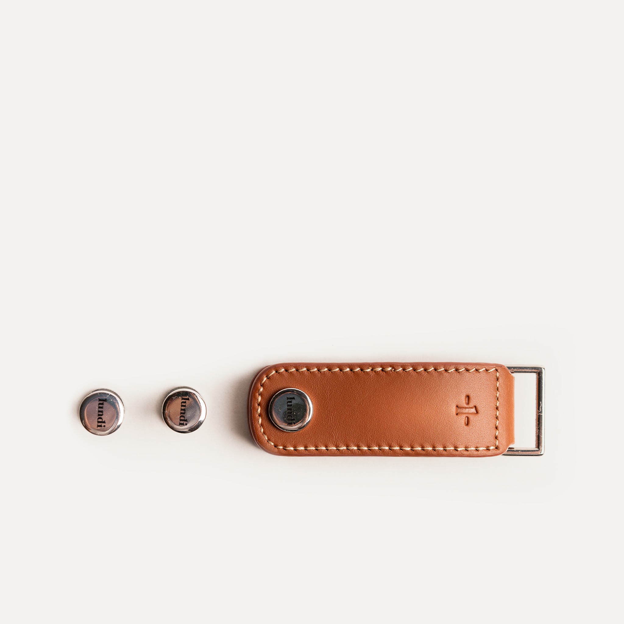 Leather key case​ comes with three screw heights.
