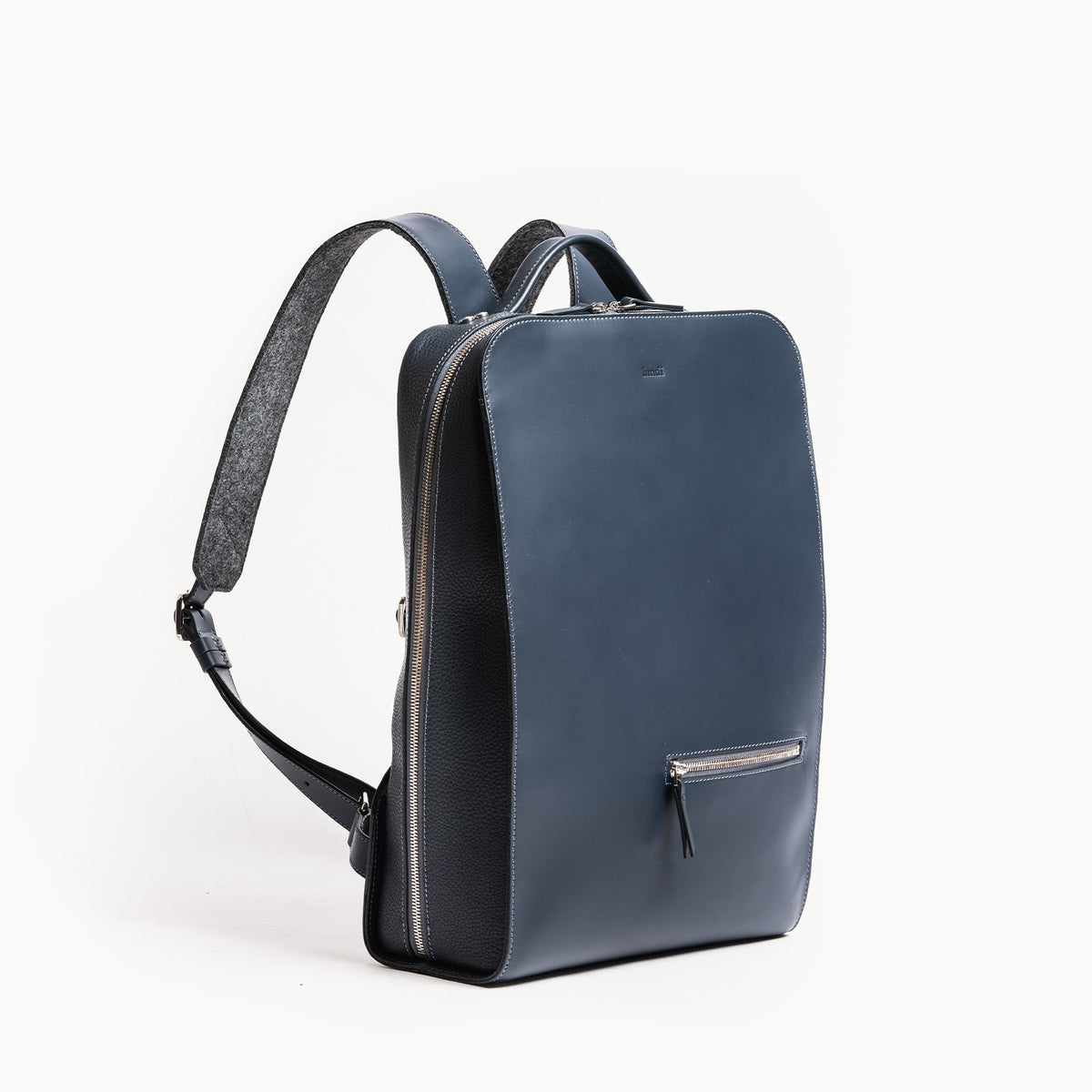 sac à dos en cuir homme bleu, design élégant et fonctionnel pour le travail et les voyages.