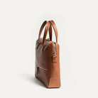 Sac homme travail élégant avec coutures contrastées et finitions en cuir pleine fleur.